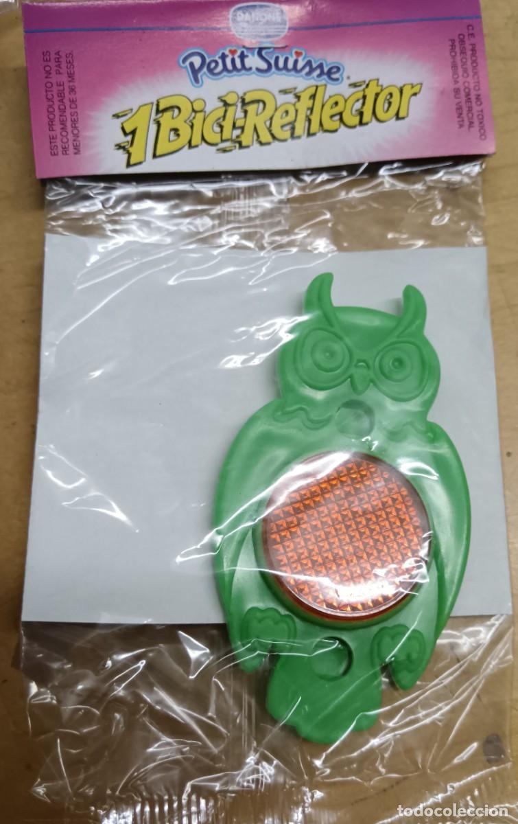 Juguetes antiguos y Juegos de colecci&oacute;n: BICI-REFLECTOR B&Uacute;HO VERDE PETIT SUISSE DANONE SIN ABRIR