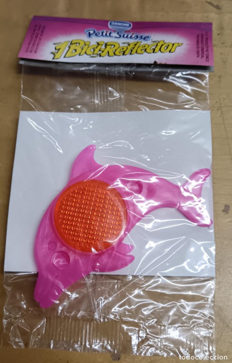 Juguetes antiguos y Juegos de colecci&oacute;n: BICI-REFLECTOR DELF&Iacute;N ROSA PETIT SUISSE DANONE SIN ABRIR