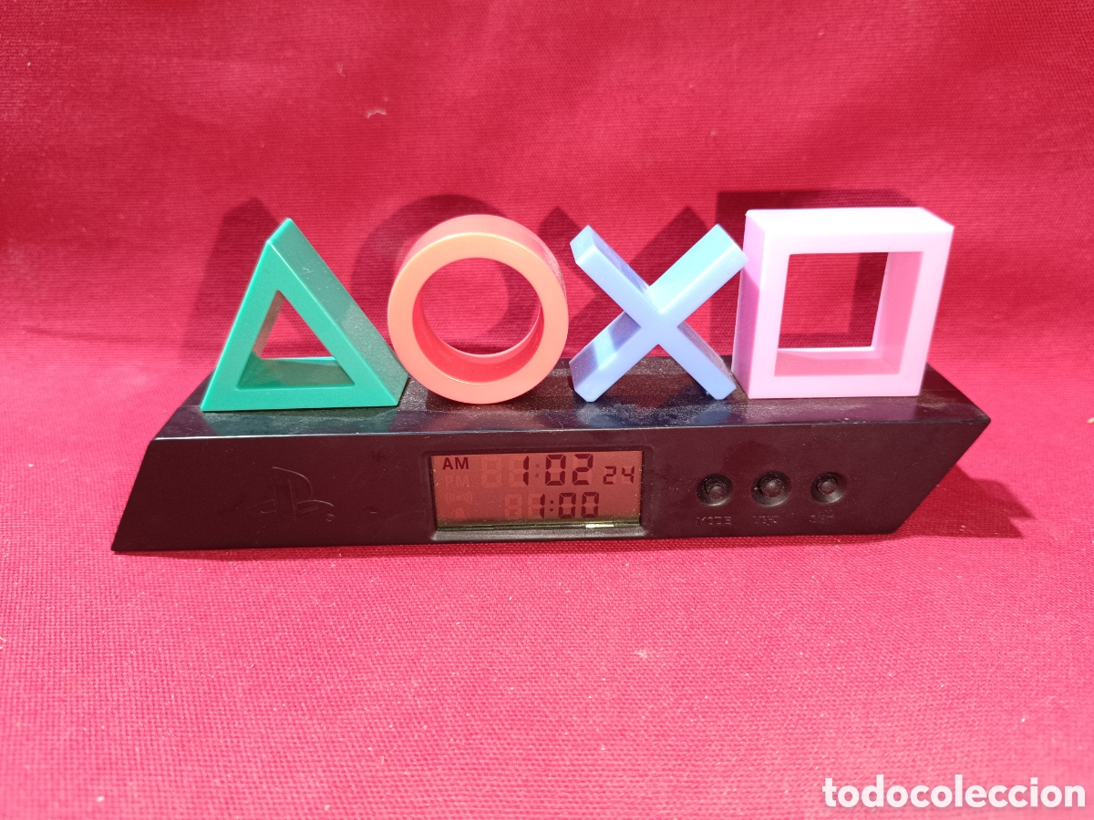 Juguetes antiguos y Juegos de colecci&oacute;n: Reloj despertador s&iacute;mbolo PlayStation publicidad Colacao Cola Cao leer descripci&oacute;n