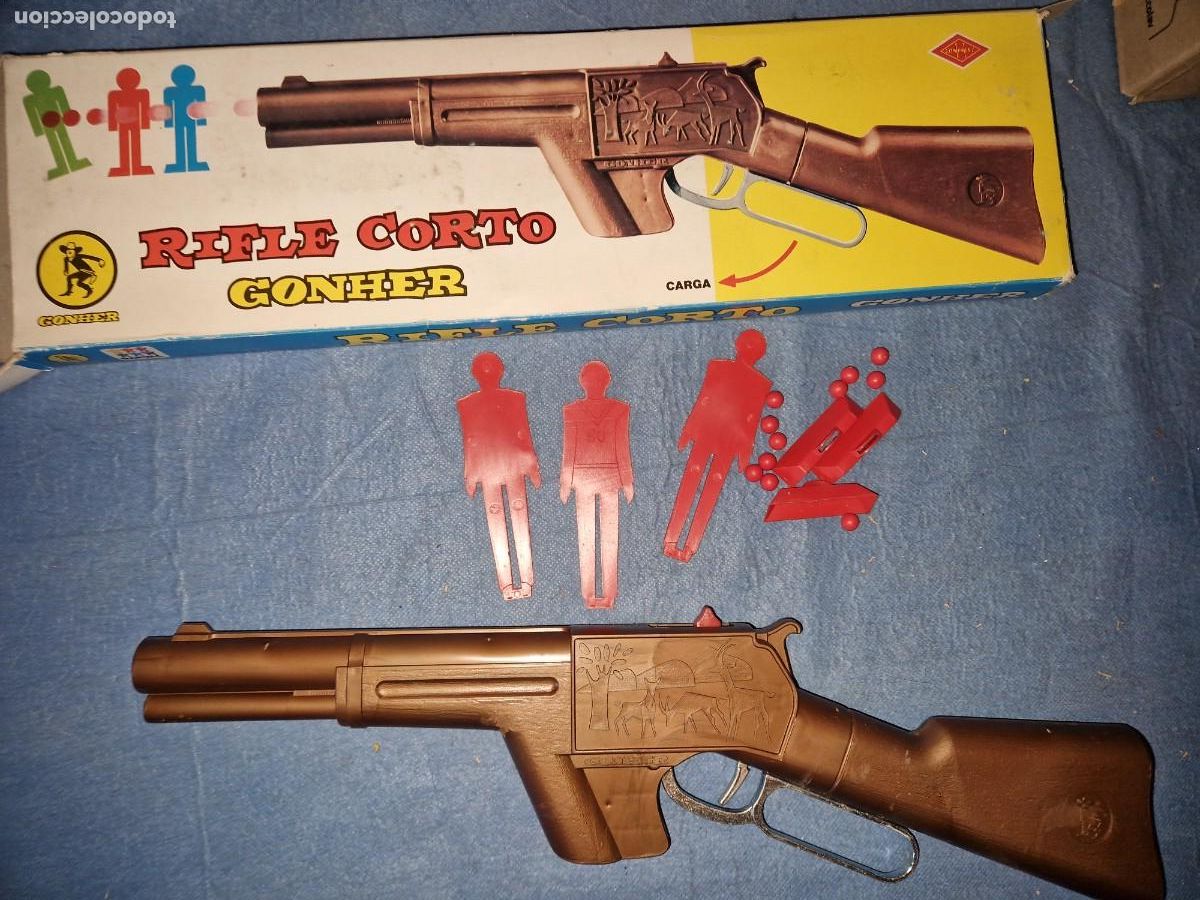 Juguetes antiguos y juegos de colecci&oacute;n: RIFLE LANZABOLAS DE GONZALEZ