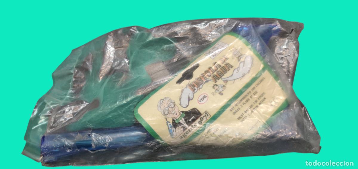 Altes Spielzeug und Spiele: Pistola de agua agente 0071