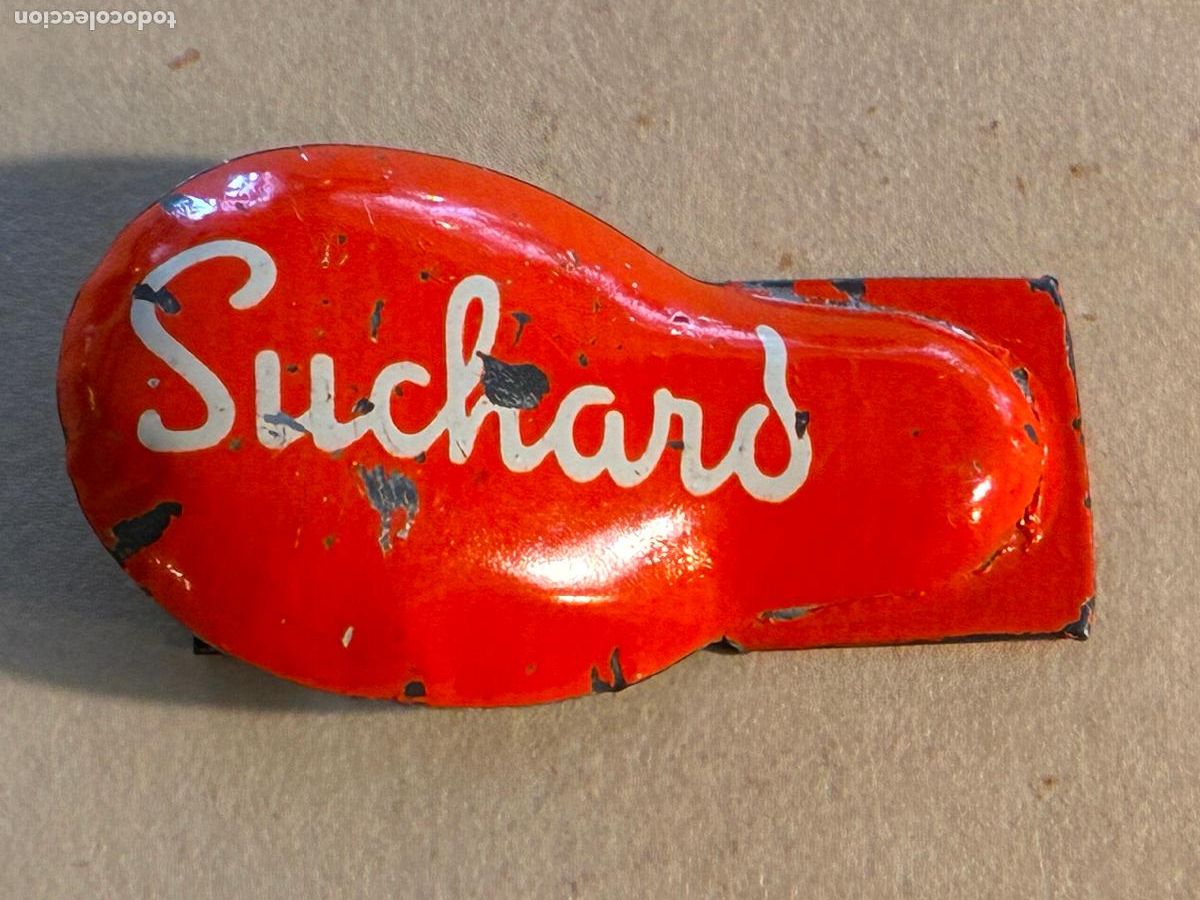 Juguetes antiguos y juegos de colecci&oacute;n: Rana de chapa hojalata publicidad chocolates Suchard color naranja algun picado