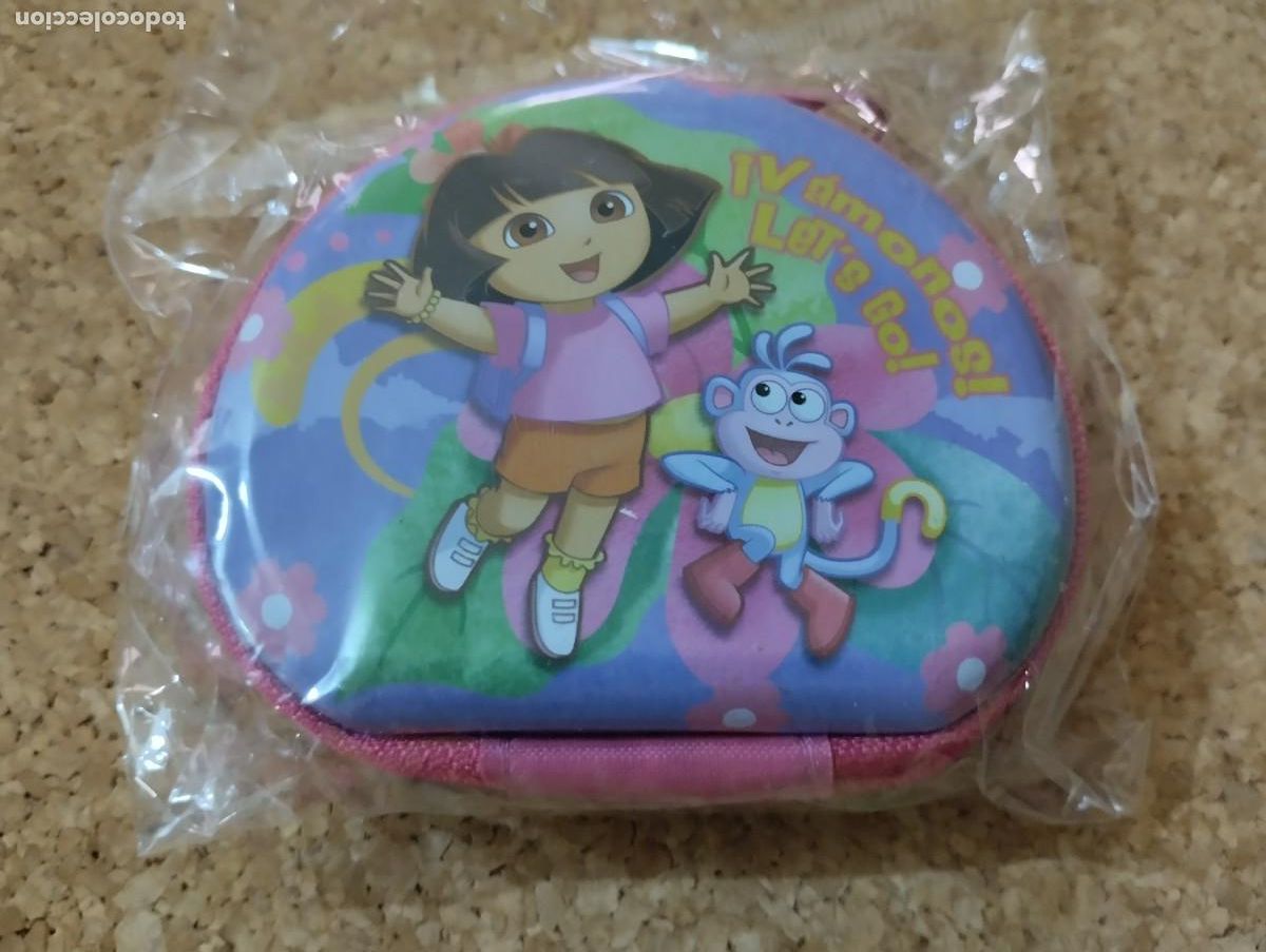 Juguetes antiguos y juegos de colecci&oacute;n: Monedero Dora exploradora - Foto 1