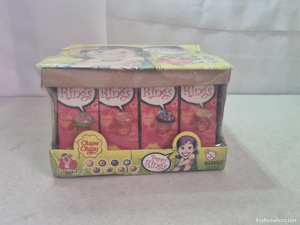 Juguetes antiguos y Juegos de colecci&oacute;n: Caja con 24 unidades de anillos de la marca Chupa Chups Poppy Rings