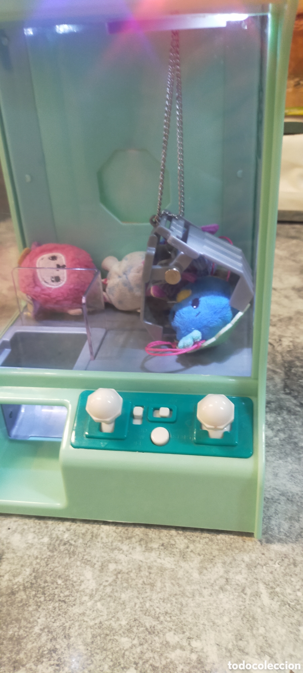 Juguetes antiguos y Juegos de colecci&oacute;n: Mini M&aacute;quina de Gancho con Luces y M&uacute;sica