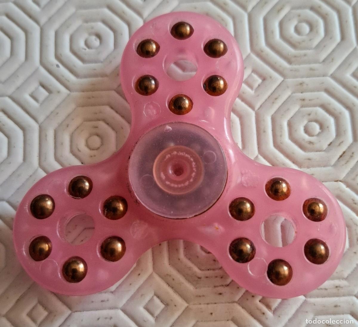 Juguetes antiguos y Juegos de colecci&oacute;n: Spinner rosa 7 x 7 cm