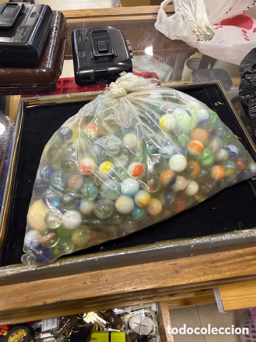 Juguetes antiguos y Juegos de colecci&oacute;n: Enorme bolsa llena de canicas antiguas