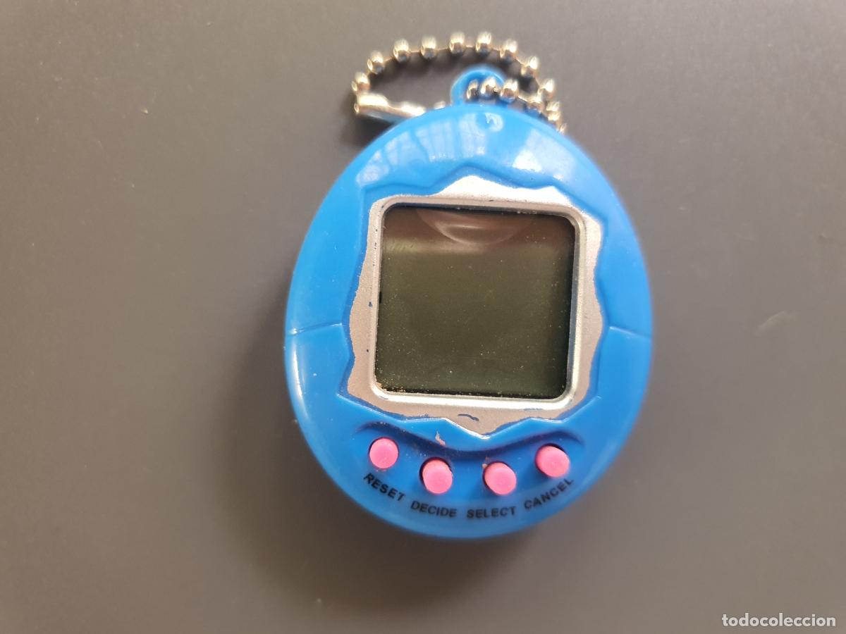Juguetes antiguos y Juegos de colecci&oacute;n: FIGURA MAQUINITA TAMAGOCHI BOOTLEG ANTIGUOS 2000S NO PROBADO