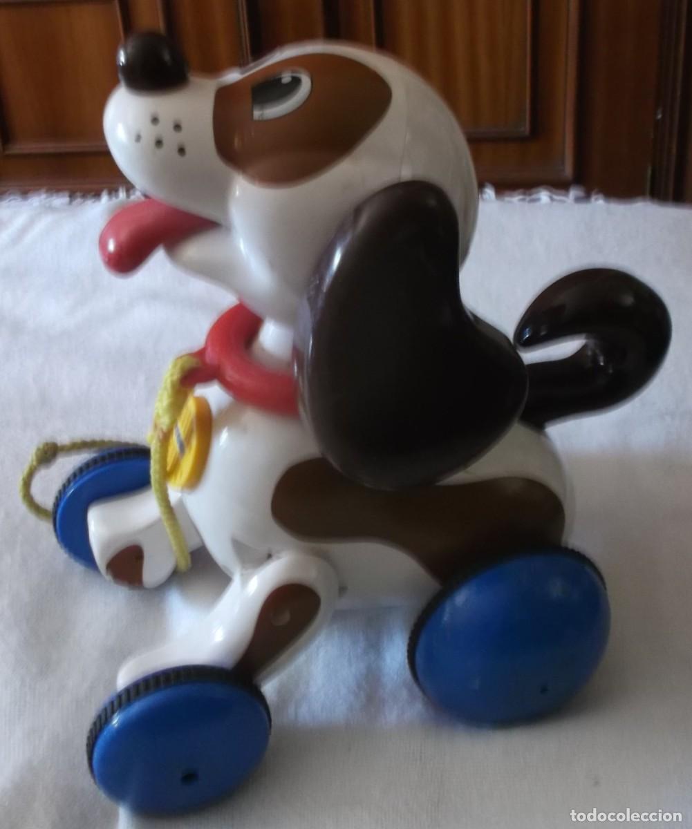 Juguetes antiguos y Juegos de colecci&oacute;n: perro con ruedas y sonido made vietnam TOMY a&ntilde;os 80