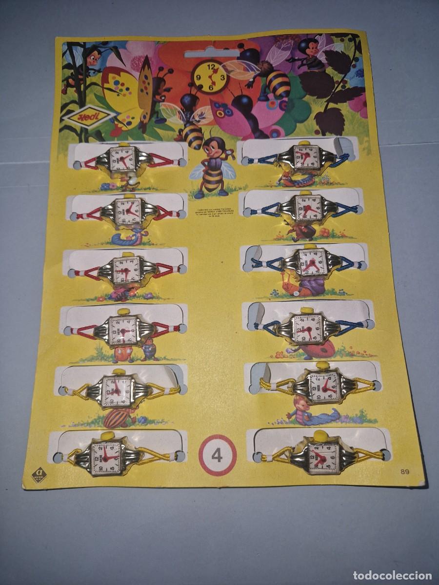 Juguetes antiguos y Juegos de colecci&oacute;n: RELOJES DE JUGUETE HEDI EXPOSITOR CON 12 RELOJES