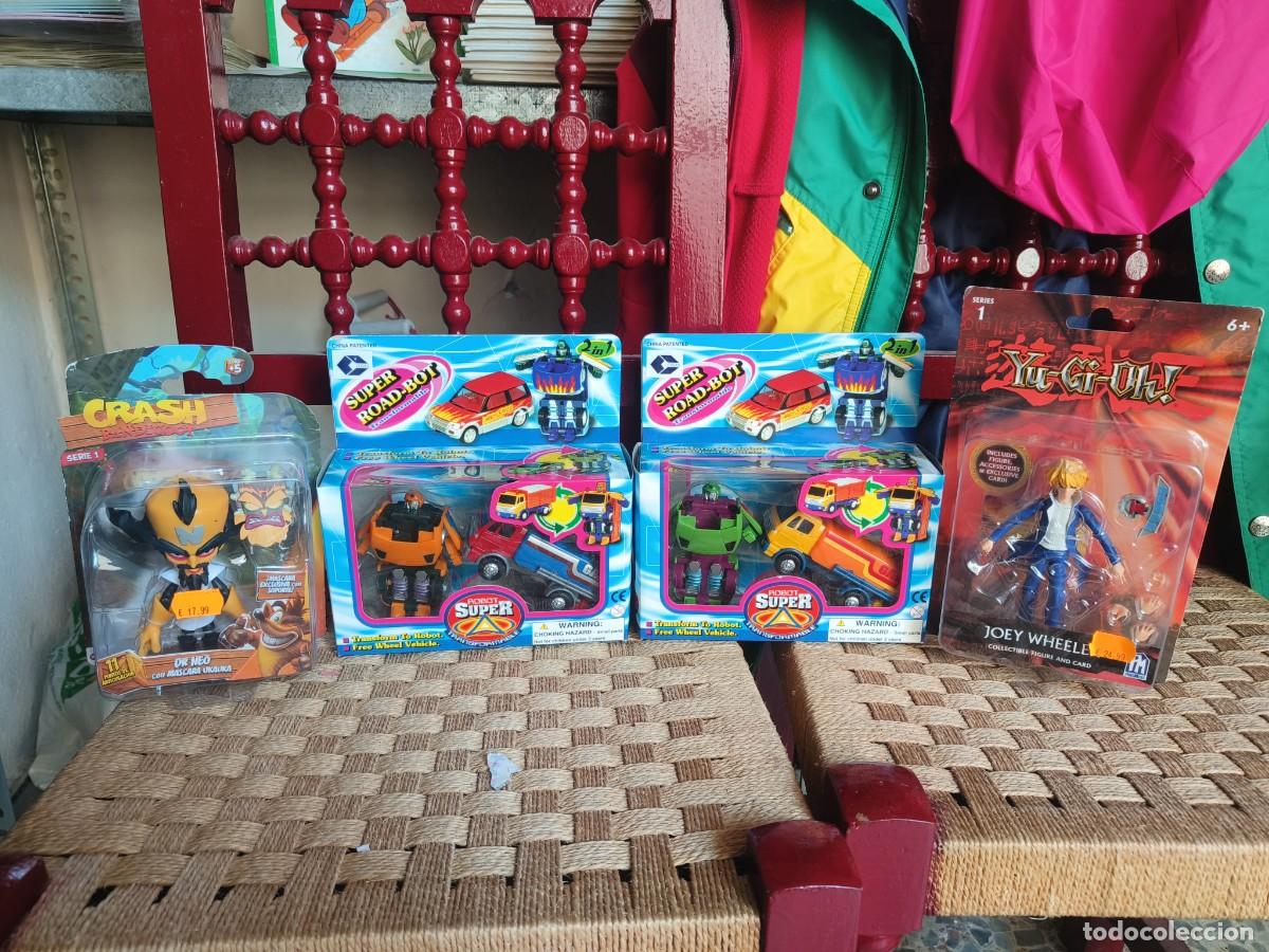 Juguetes antiguos y Juegos de colecci&oacute;n: Lote de 4 antiguos blisters juguetes sin abrir . Yu Gi Oh - Crash Bandicoot - Bootleg transformers