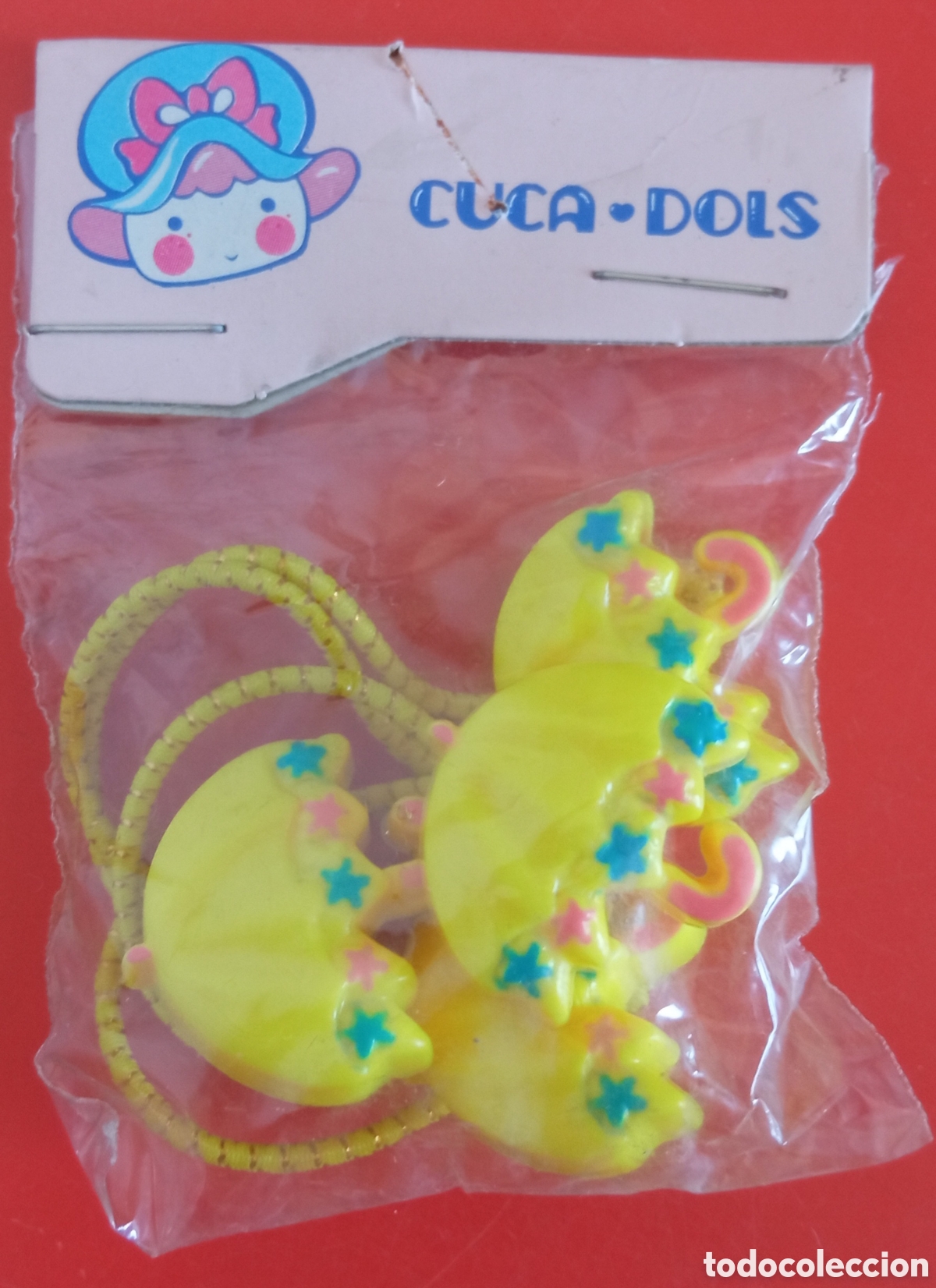 Juguetes antiguos y Juegos de colecci&oacute;n: COLETEROS PARAGUAS AMARILLOS CUCA-DOLS.JUYPAL 80'S.BOLSITA SIN ABRIR.