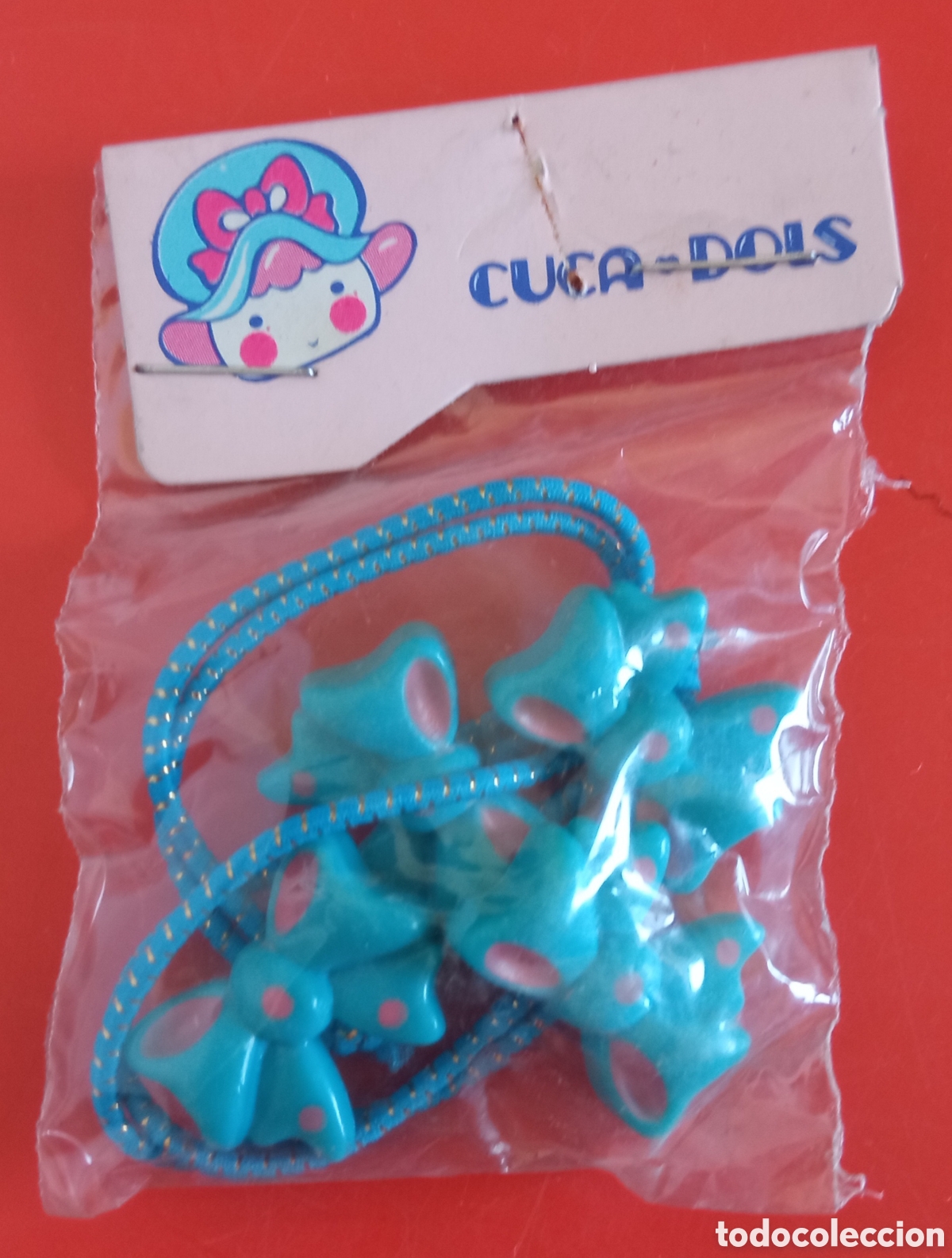 Juguetes antiguos y Juegos de colecci&oacute;n: COLETEROS LACITOS AZULES CUCA-DOLS.JUYPAL 80'S.BOLSITA SIN ABRIR.