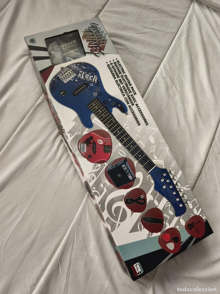 Juguetes antiguos y Juegos de colecci&oacute;n: Paquete de guitarra el&eacute;ctrica infantil con accesorios, comercializado bajo la marca Groovy Tunes