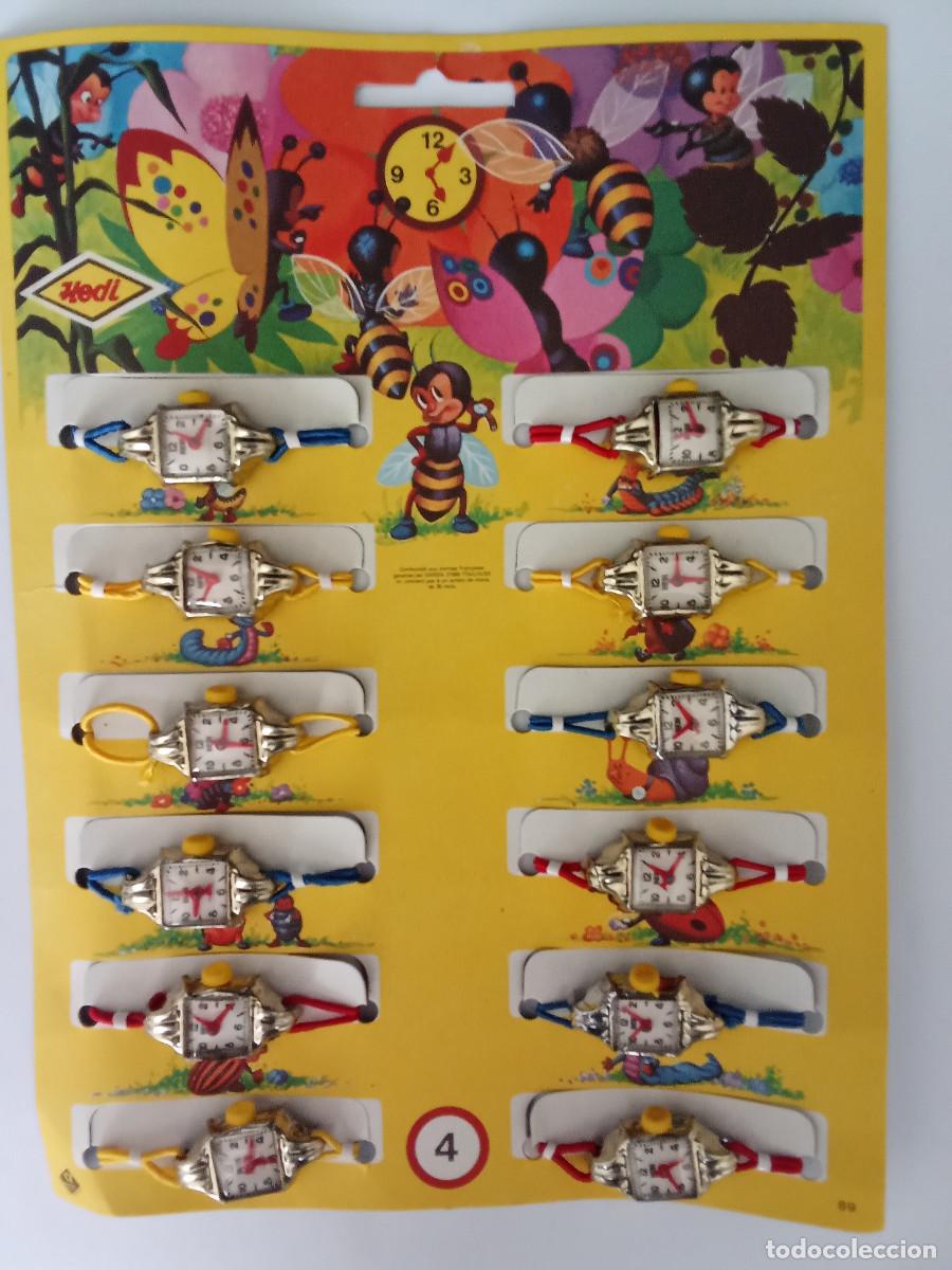 Juguetes antiguos y Juegos de colecci&oacute;n: Expositor con doce relojes Hedi a&ntilde;os 60 - 70