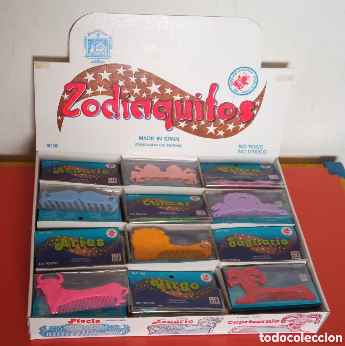 Juguetes antiguos y juegos de colecci&oacute;n: CAJA EXPOSITORA DE 120 PEINES HOR&Oacute;SCOPO / ZODIACO.ZODIAQUITOS PERY 70'S.NUEVOS.