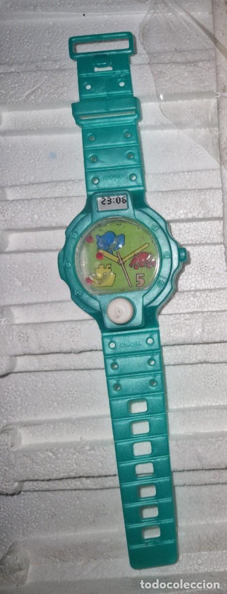 Juguetes antiguos y juegos de colecci&oacute;n: RELOJ JUEGO DE AGUA DE LA MARCA CHICOS