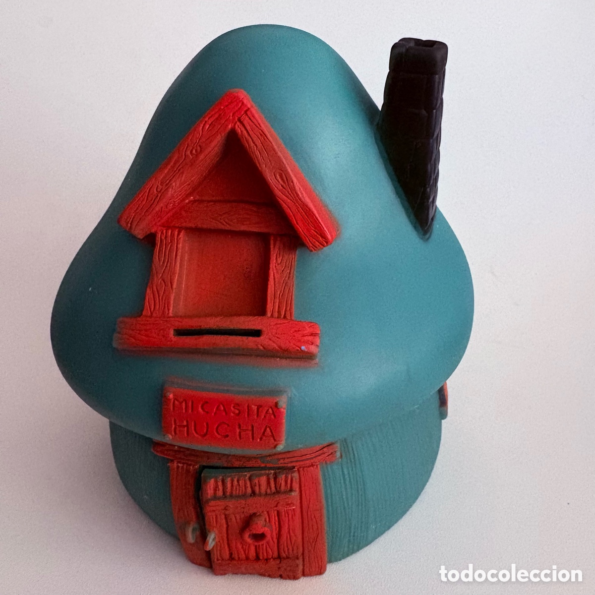 Juguetes antiguos y juegos de colecci&oacute;n: ANTIGUA HUCHA A&Ntilde;OS 80 CASA SETA DE LOS PITUFOS DE GOMA