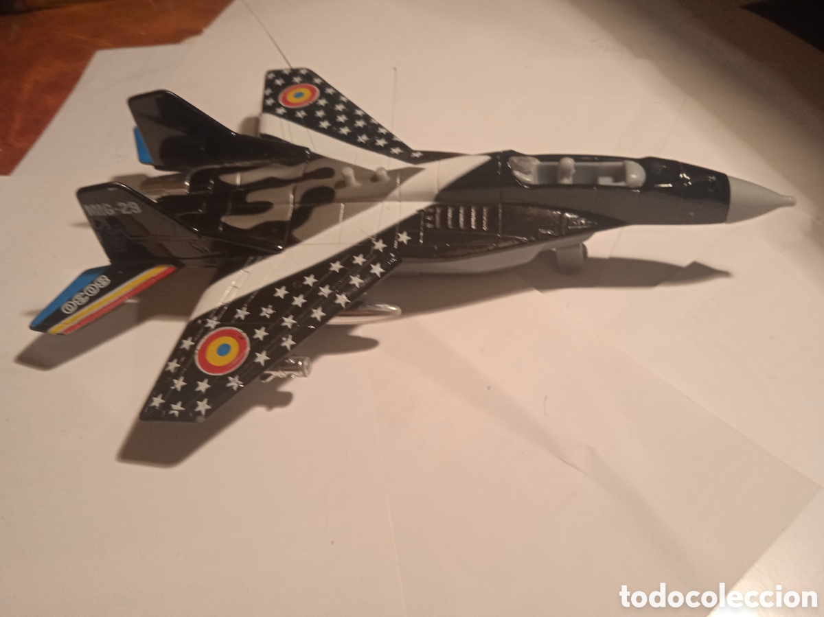 Juguetes antiguos y juegos de colecci&oacute;n: AVION COMBATE METAL NUEVO 20 CMS