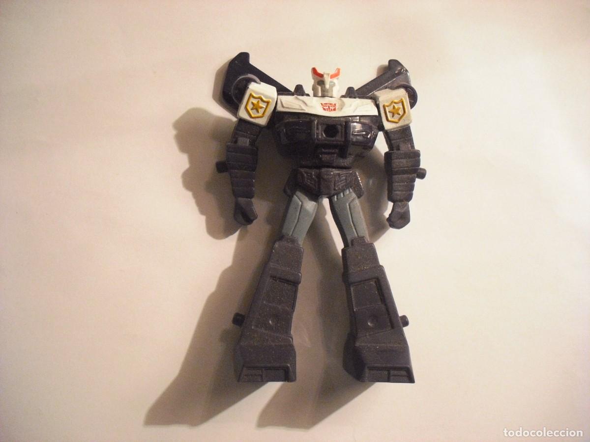 Giocattoli antichi e Giochi di collezione: FIGURA TRANSFORMER , AUTOROBOT QUE SE TRANSFORMA EN VEHICULO DE POLICIA. MACDONALD&acute;S