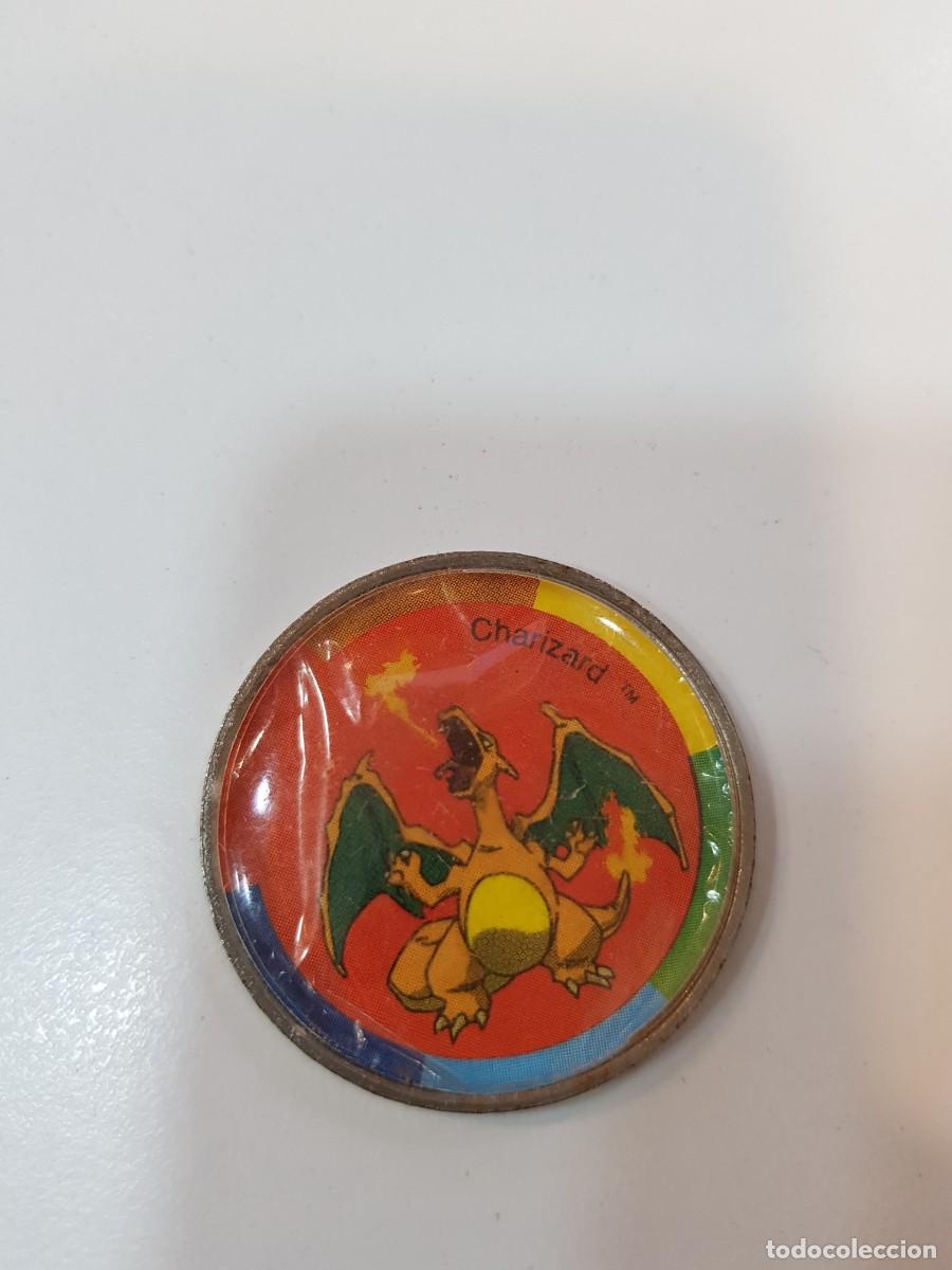 Juguetes antiguos y juegos de colecci&oacute;n: Moneda metalica tipo tazo Pokemon 2001 Charizard