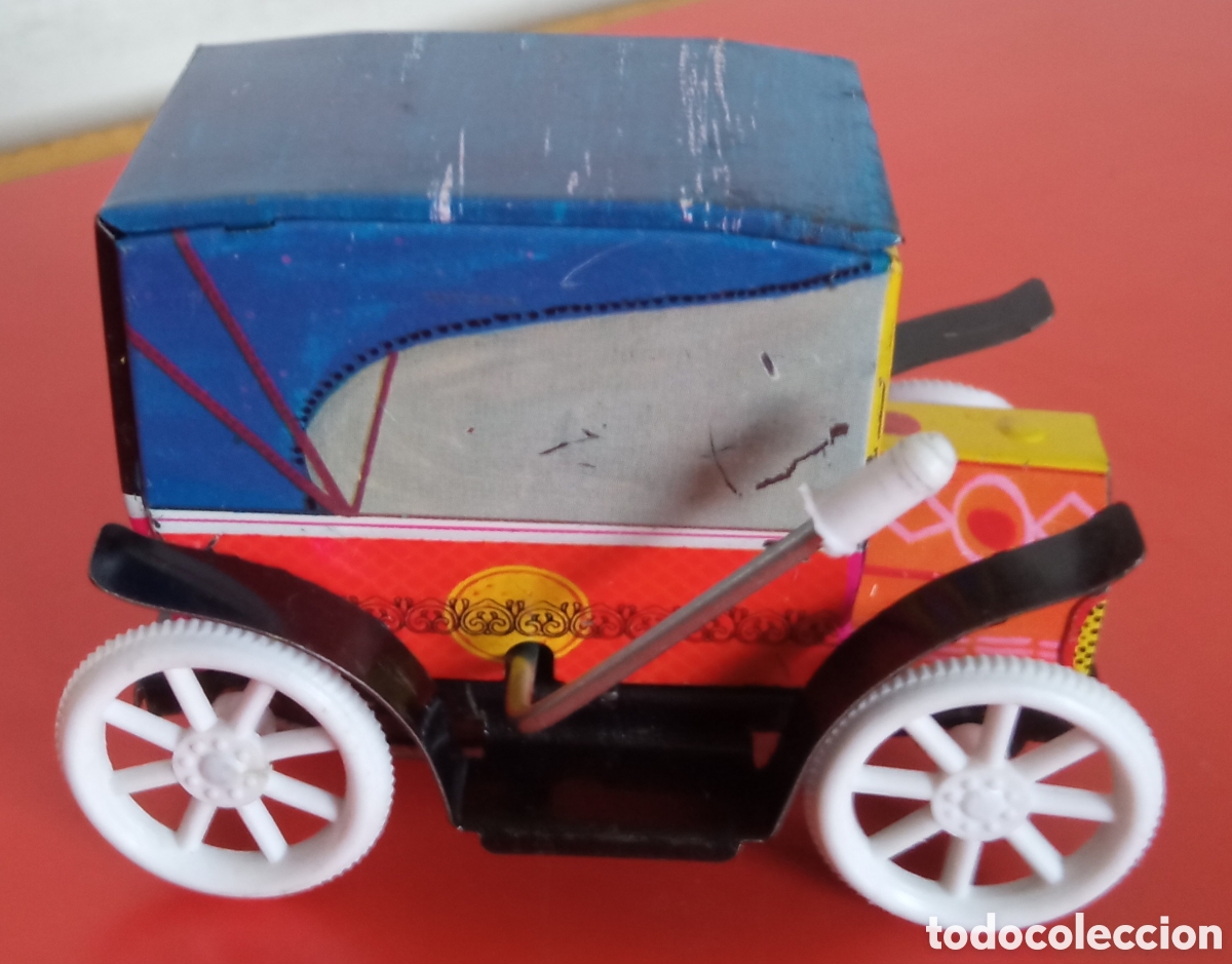 Juguetes antiguos y juegos de colecci&oacute;n: COCHE &Eacute;POCA DE HOJALATA A RESORTE.PAYVA 70'S.SIN USO.