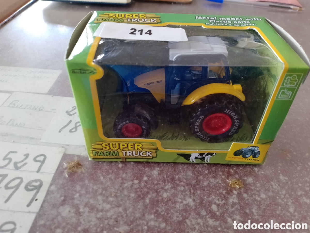 Juguetes antiguos y juegos de colecci&oacute;n: Tractor agr&iacute;cola a escala