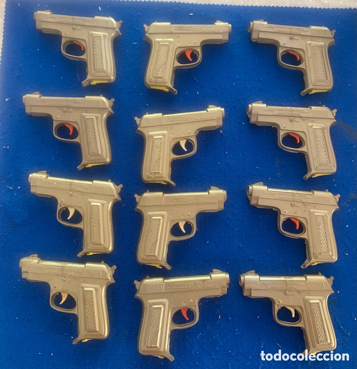 Juguetes antiguos y juegos de colecci&oacute;n: LOTE 12 PISTOLAS AGUA MOIP JUNIOR 100 CALIBRE 9 CORTO