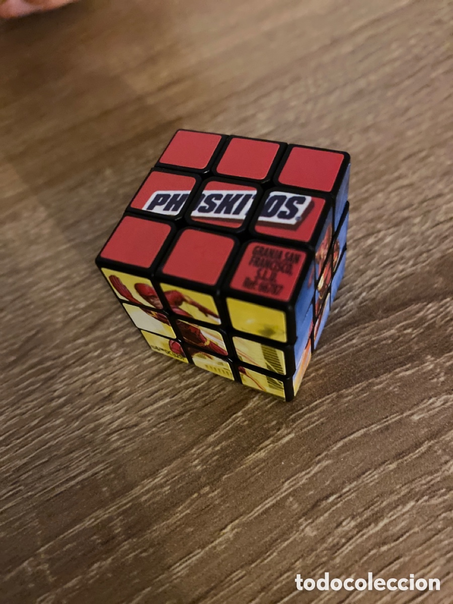 Juguetes antiguos y juegos de colecci&oacute;n: CUBO RUBIK PROMOCIONAL PHOSKITOS FLASH
