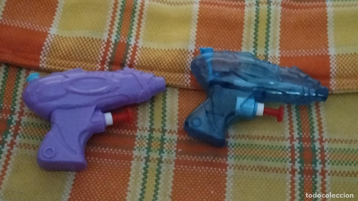 Juguetes antiguos y juegos de colecci&oacute;n: 2 PISTOLAS DE AGUA----------------------------------------
