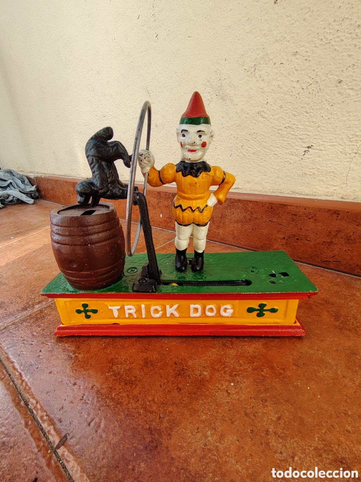 Juguetes antiguos y juegos de colecci&oacute;n: HUCHA PAYASO Y PERRO TRICK DOG