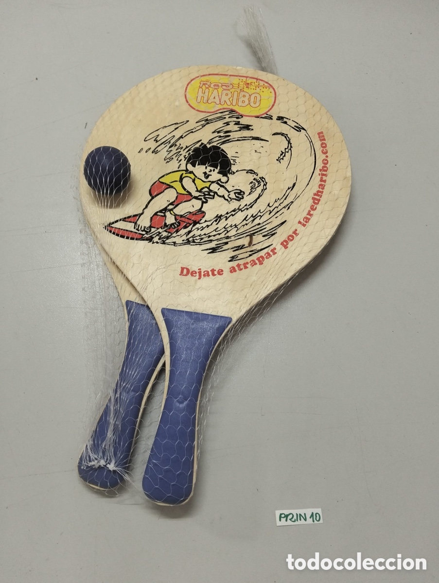 Juguetes antiguos y juegos de colecci&oacute;n: palas de playa de madera de la marca Haribo con un dise&ntilde;o ilustrado de un ni&ntilde;o
