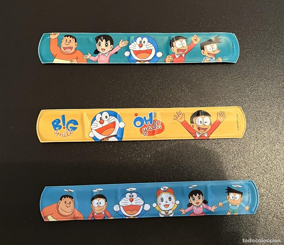Juguetes antiguos y juegos de colecci&oacute;n: Set 3 Pulseras Slap Doraemon y Amigos