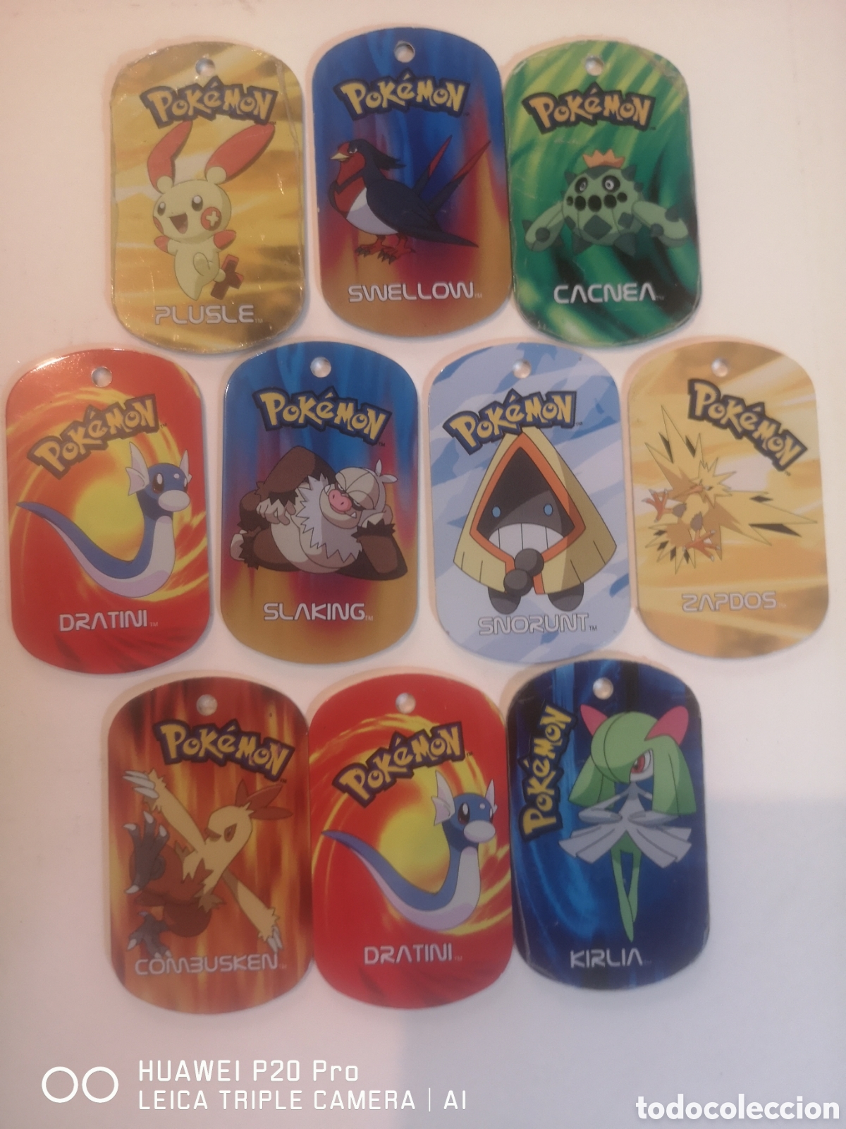 Juguetes antiguos y juegos de colecci&oacute;n: POKEMON METAL TAGS - LOTE