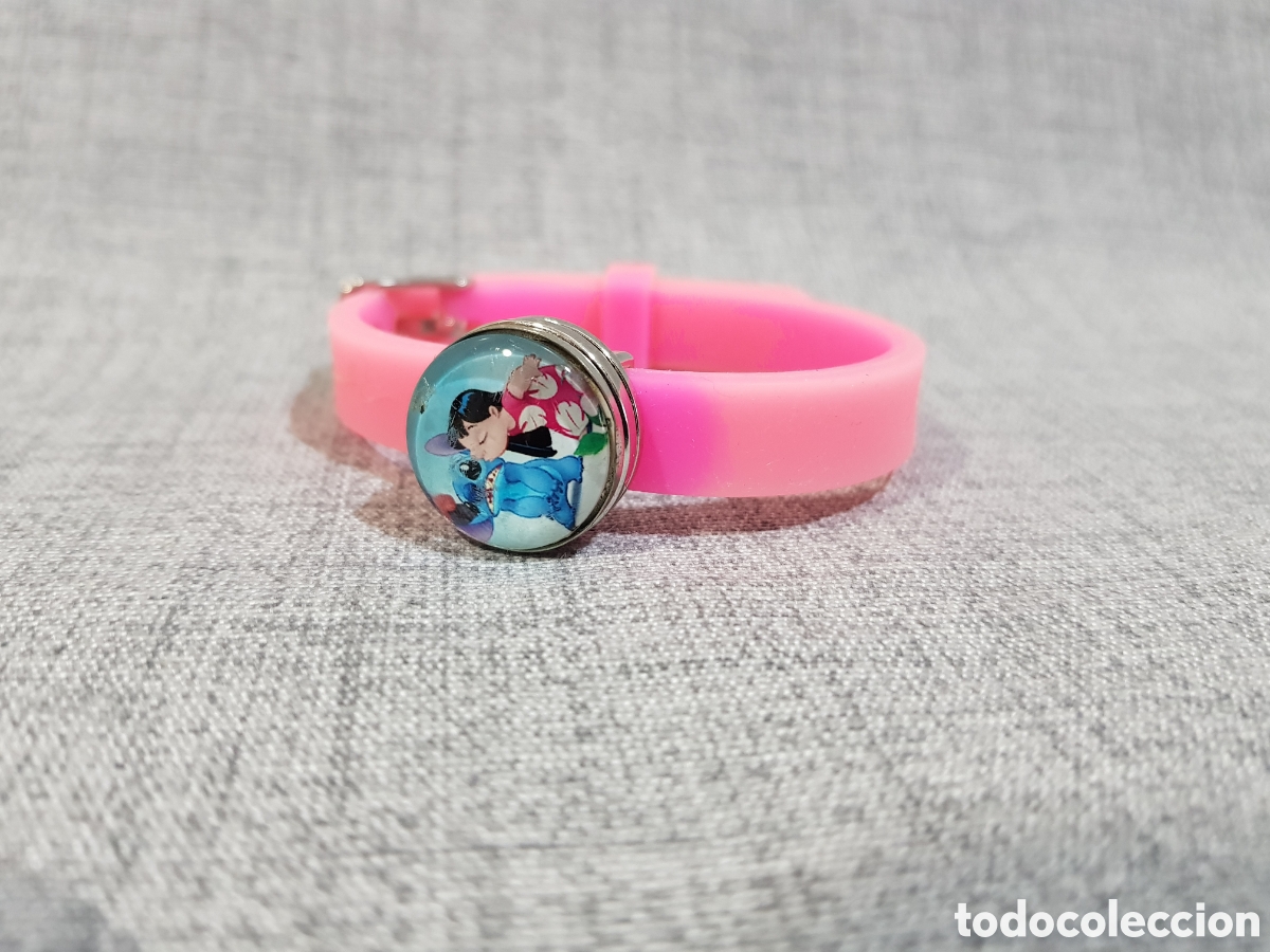 Juguetes antiguos y juegos de colecci&oacute;n: PULSERA INFANTIL CON BOTONES INTERCAMBIABLES LILO Y STITCH