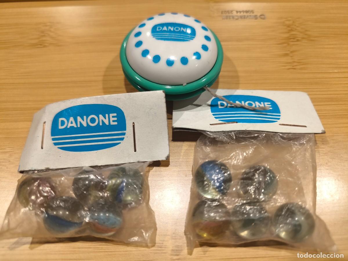Juguetes antiguos y juegos de colecci&oacute;n: Lote canicas y yoyo - Danone