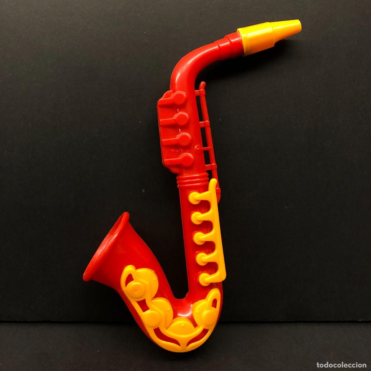 Juguetes antiguos y juegos de colecci&oacute;n: SAXOFON DE JUGUETE - DE PL&Aacute;STICO - INSTRUMENTO MUSICAL INFANTIL - 16 X 4 CM / 84