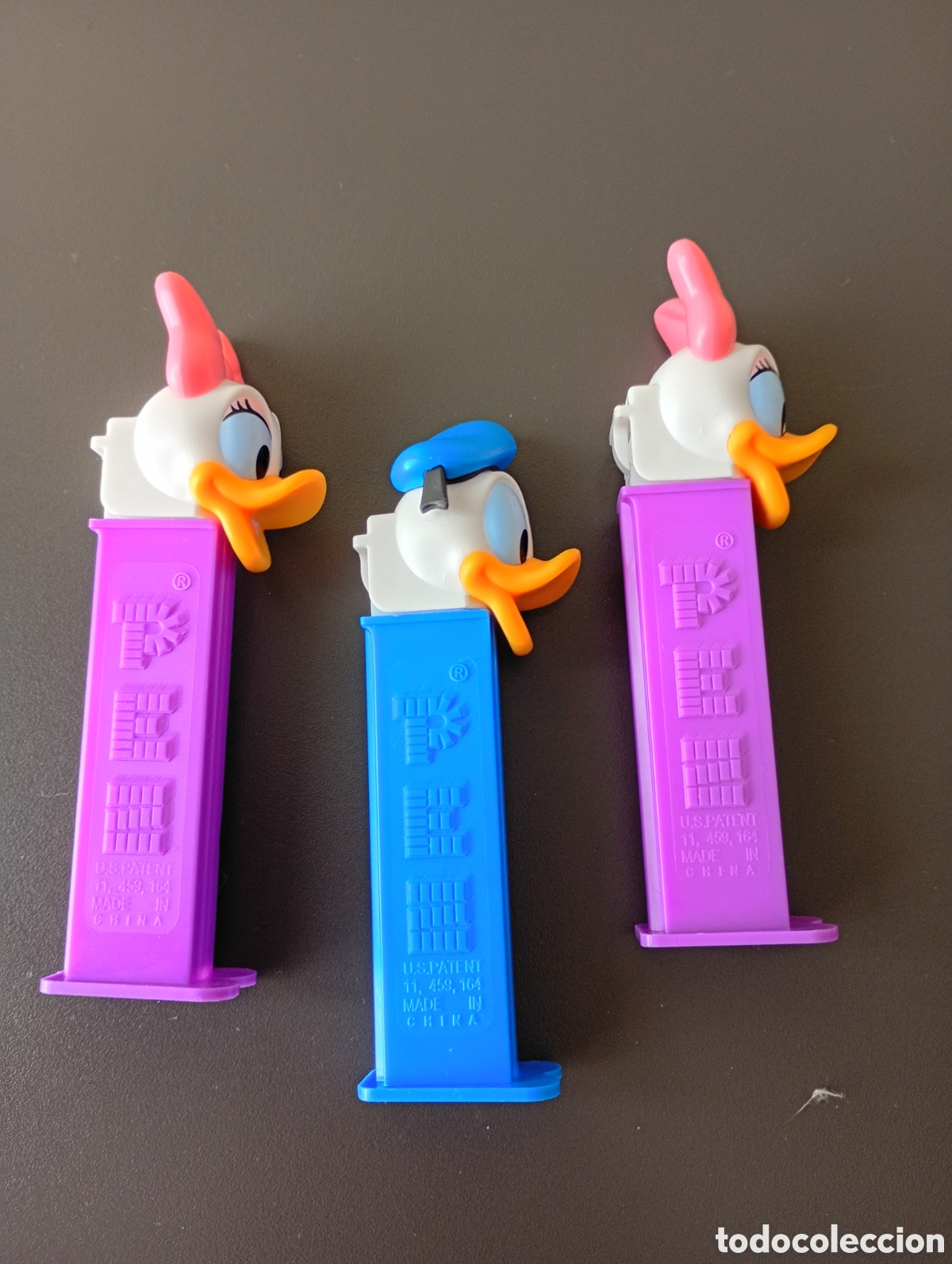 Juguetes antiguos y juegos de colecci&oacute;n: Disney.Daisy y pato donald.Lote de dispensadores pez