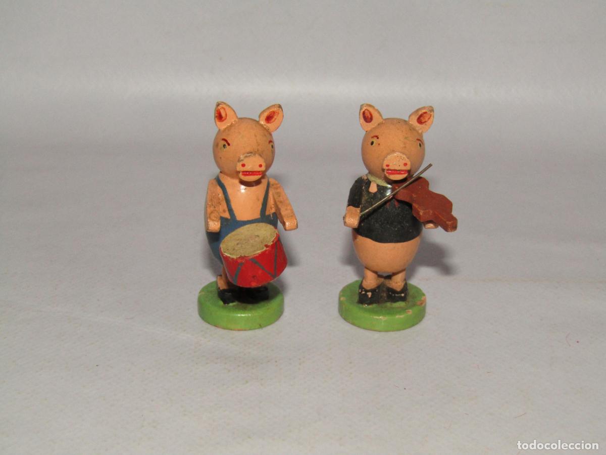 Juguetes antiguos y juegos de colecci&oacute;n: Antiguos Cerditos M&uacute;sicos en Madera Policromada