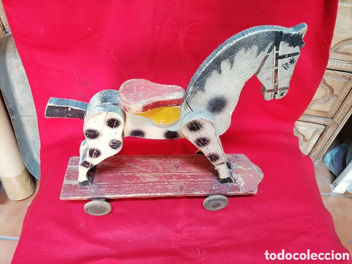 Juguetes antiguos y juegos de colecci&oacute;n: Antiguo Caballo de juguete con ruedas