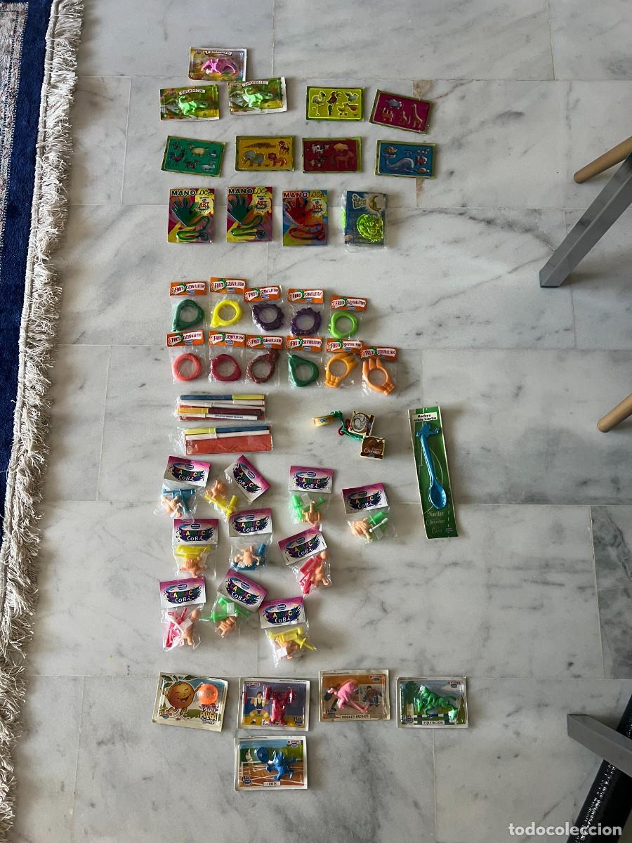 Juguetes antiguos y juegos de colecci&oacute;n: LOTE REGALO PROMOCIONAL DANONE DINOSAURIOS COBI NATILLAS SERVILLETEROS MANO LOCA
