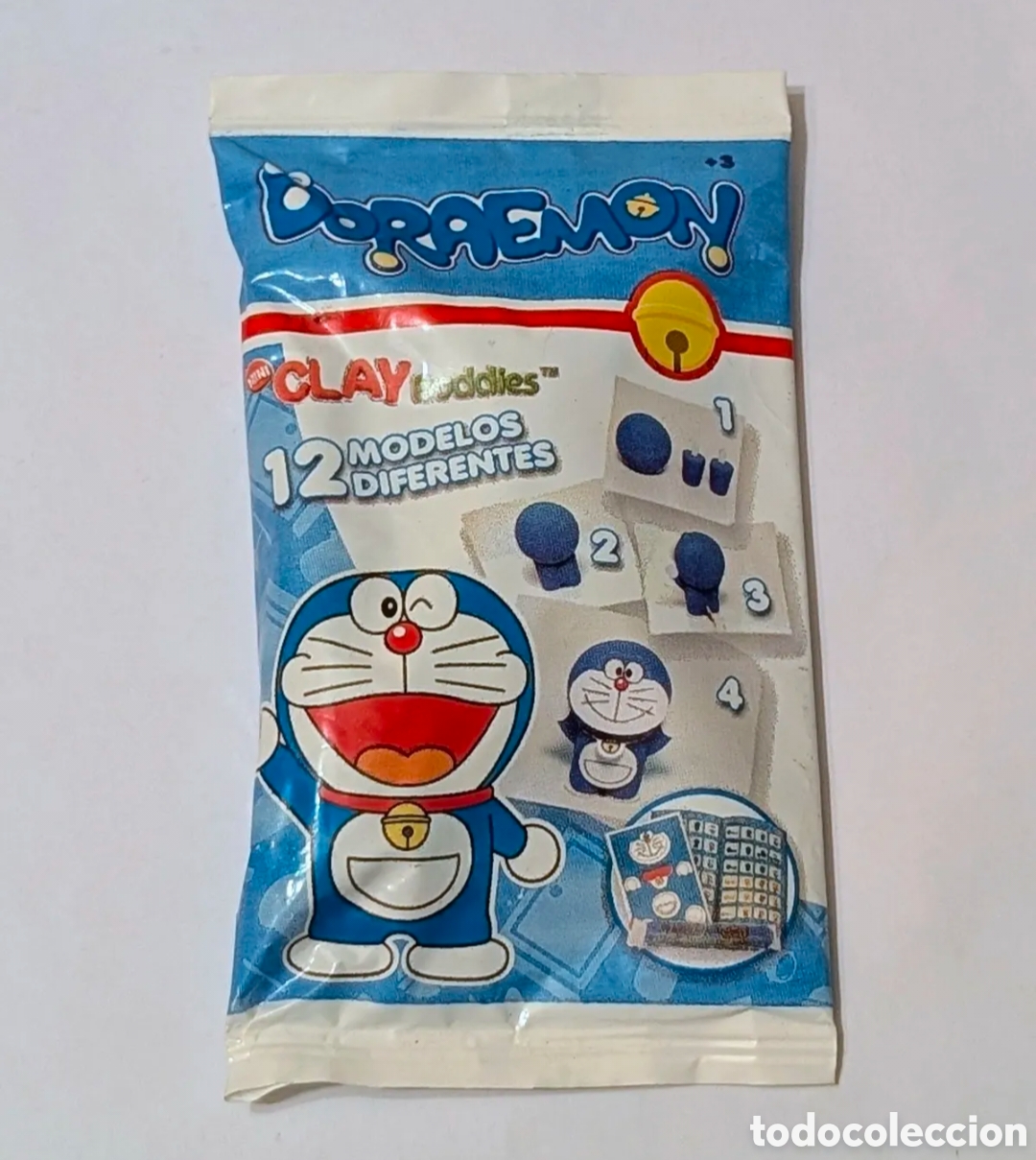 Juguetes antiguos y juegos de colecci&oacute;n: Raro sobre sin abrir Doraemon