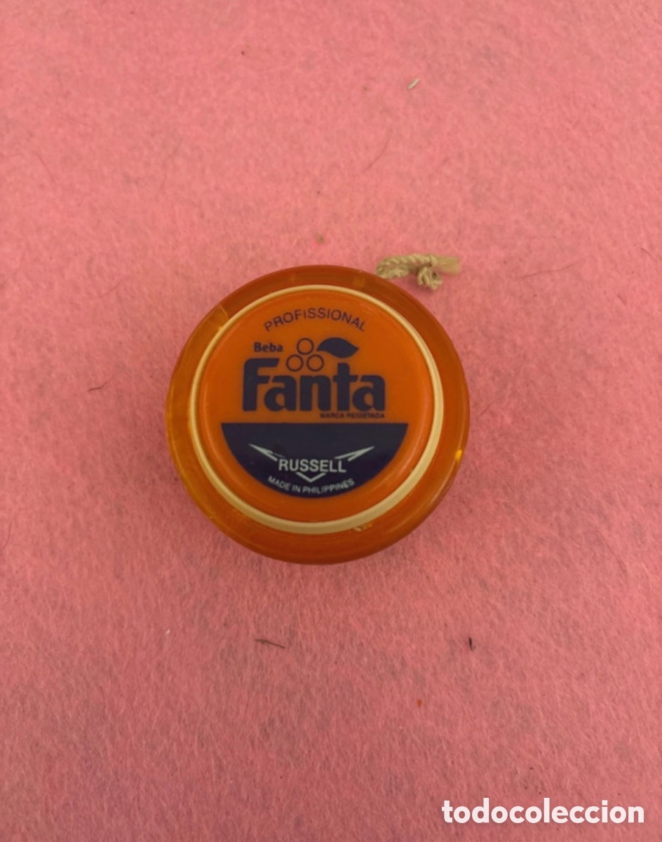 Juguetes antiguos y juegos de colecci&oacute;n: Yoyo Russell Fanta transparente (A17)