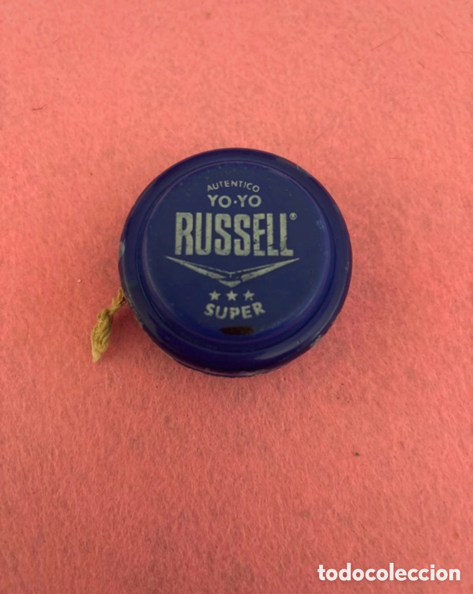 Juguetes antiguos y juegos de colecci&oacute;n: Yoyo azul transparente S&uacute;per Russell (A17)