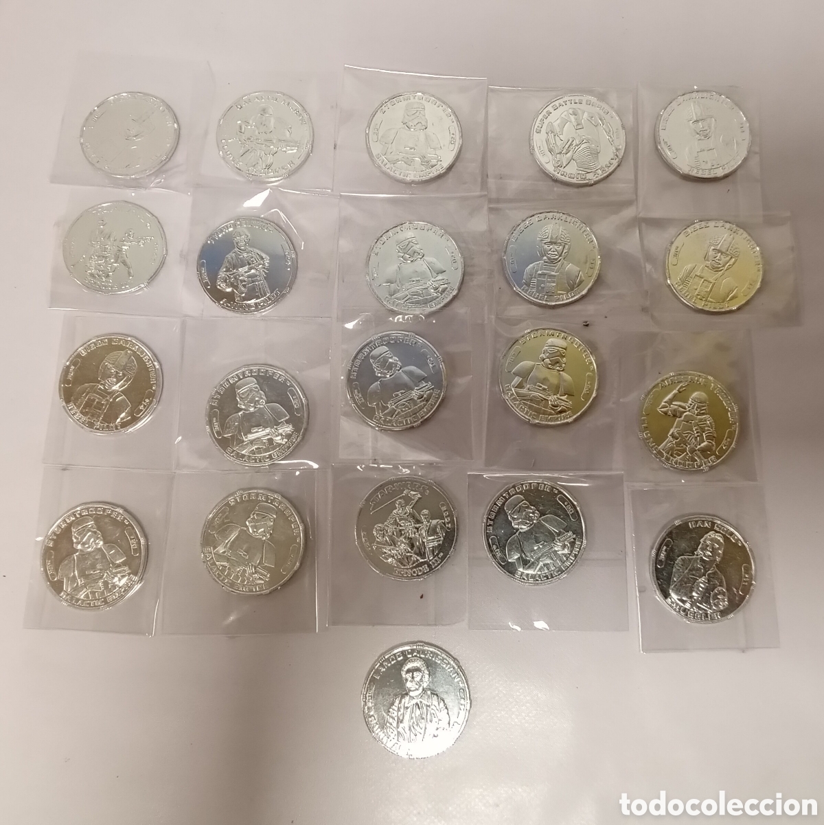 Juguetes antiguos y juegos de colecci&oacute;n: Lote 21 monedas metal 30 th star wars Hasbro