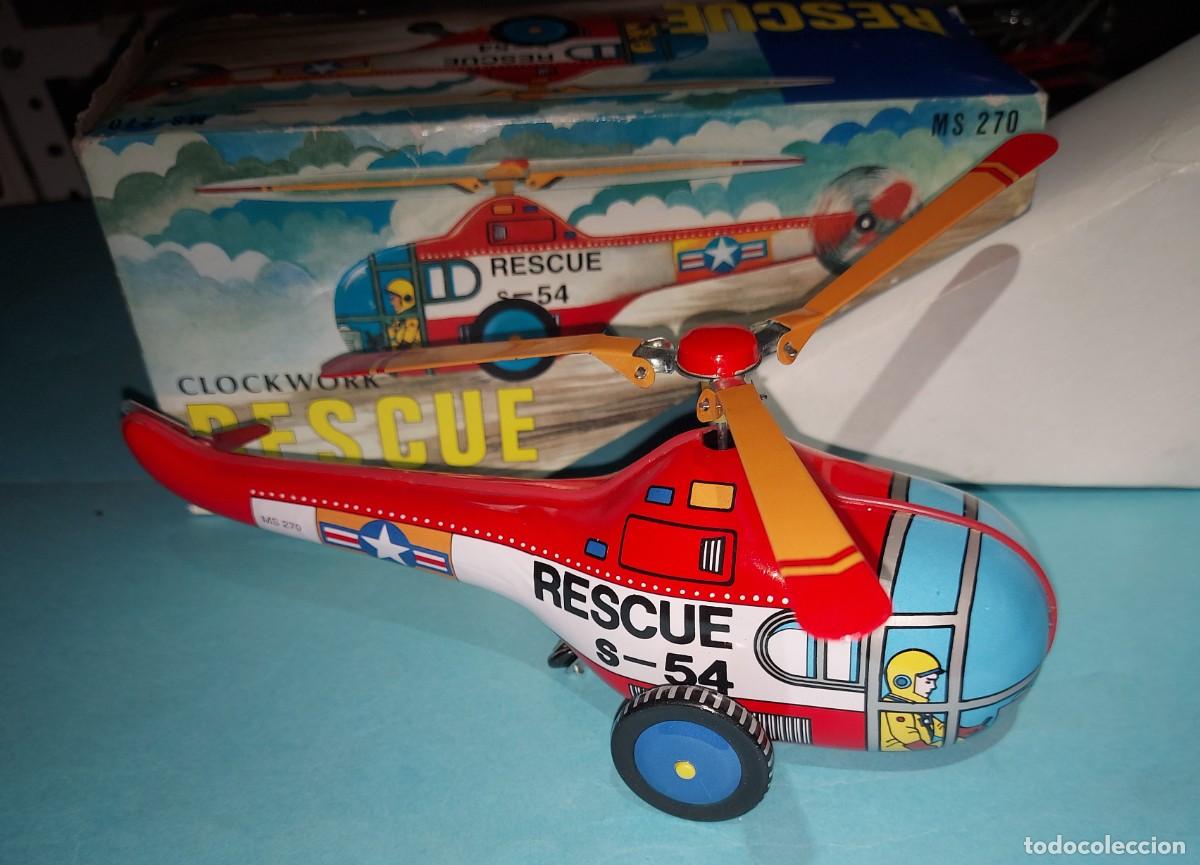 Juguetes antiguos y juegos de colecci&oacute;n: HELICOPTERO VINTAGE DE METAL CON MECANISMO A CUERDA