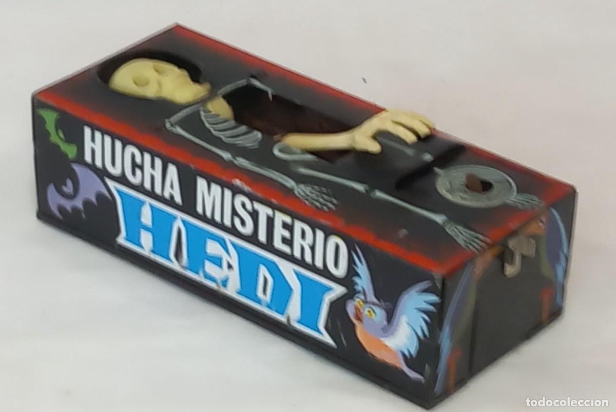 Juguetes antiguos y juegos de colecci&oacute;n: ANTIGUA HUCHA MISTERIO-HEDI DE HOJALATA - FUNCIONA
