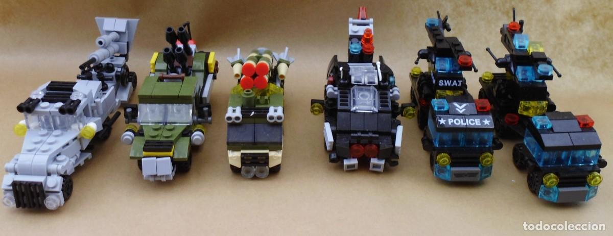 Juguetes antiguos y juegos de colecci&oacute;n: Conjunto de seis veh&iacute;culos construidos con piezas compatibles con el sistema de bloques tipo Lego.