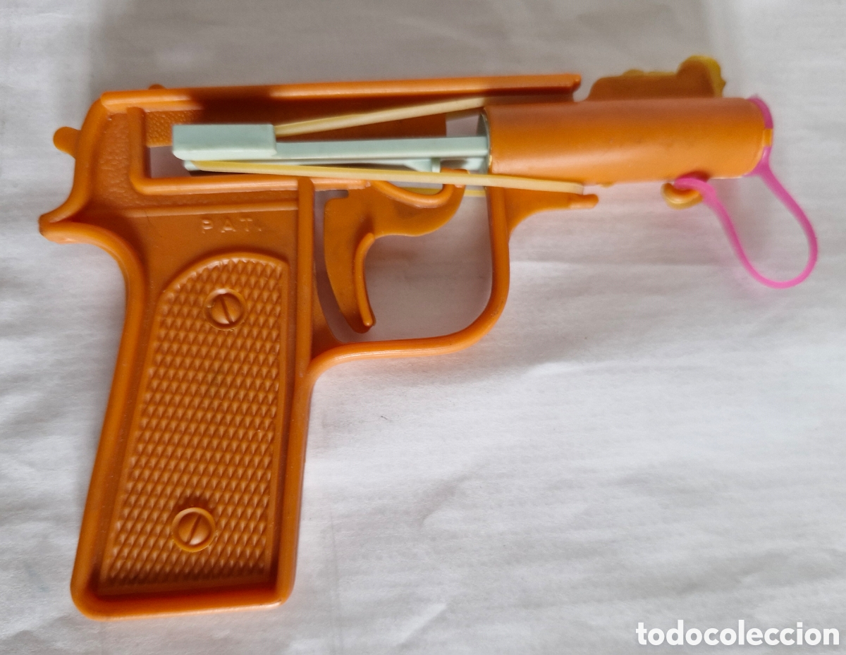 Brinquedos antigos e Jogos de cole&ccedil;&atilde;o: PISTOLA LANZA TAP&Oacute;N.NACIONAL 70'S.SIN USO.
