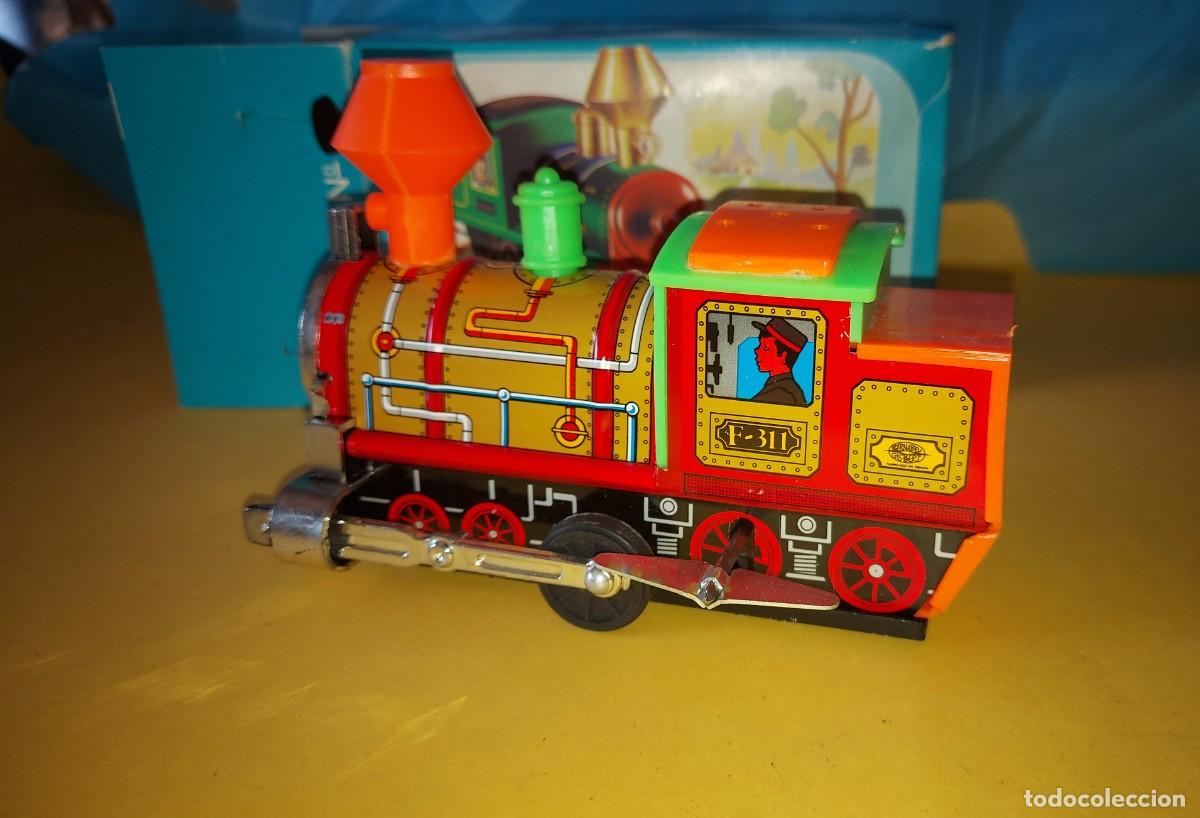 Juguetes antiguos y juegos de colecci&oacute;n: LOCOMOTORA SONORA CON RESORTE